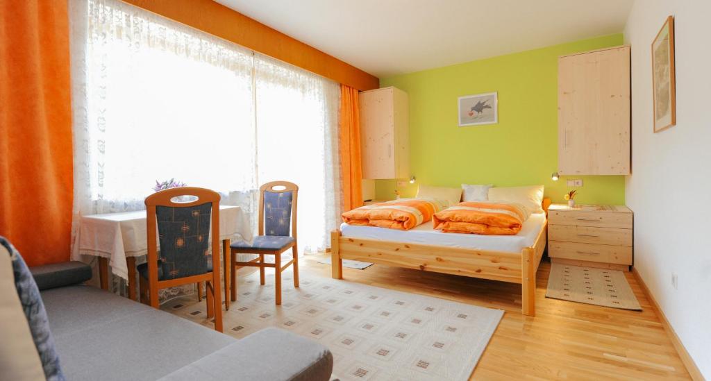 Postel nebo postele na pokoji v ubytování Haus Mairösl