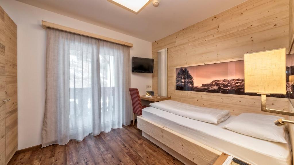 Postel nebo postele na pokoji v ubytování Hotel Interski