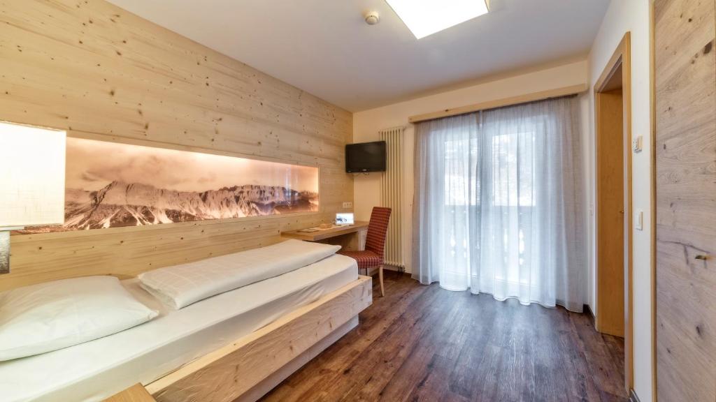 Postel nebo postele na pokoji v ubytování Hotel Interski