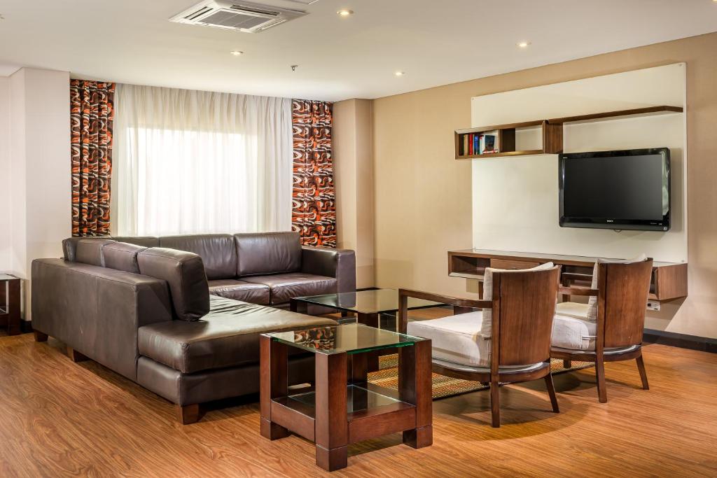 TV a/nebo společenská místnost v ubytování Casa Dann Carlton Hotel & SPA