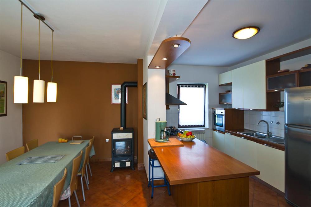 Kuchyň nebo kuchyňský kout v ubytování Apartment Villa Gasparini