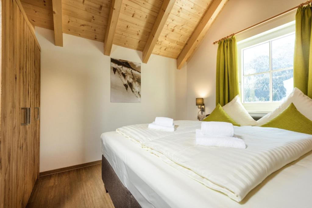 Postel nebo postele na pokoji v ubytování AlpenParks Hagan Lodge Altaussee