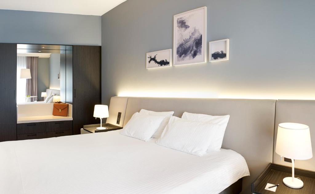 Postel nebo postele na pokoji v ubytování Van der Valk Hotel Spa