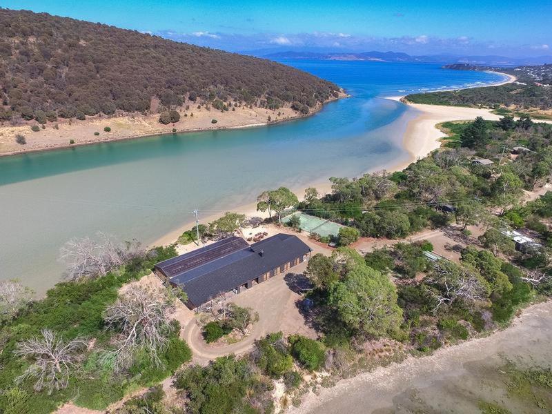 an aerial view of a building next to a body of water at Steeles Island Retreat in Carlton