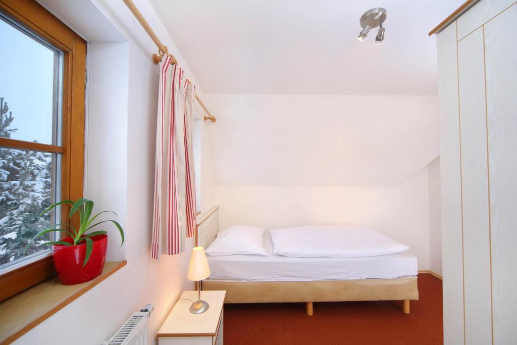 Postel nebo postele na pokoji v ubytování Villa 6 Vrchlabí