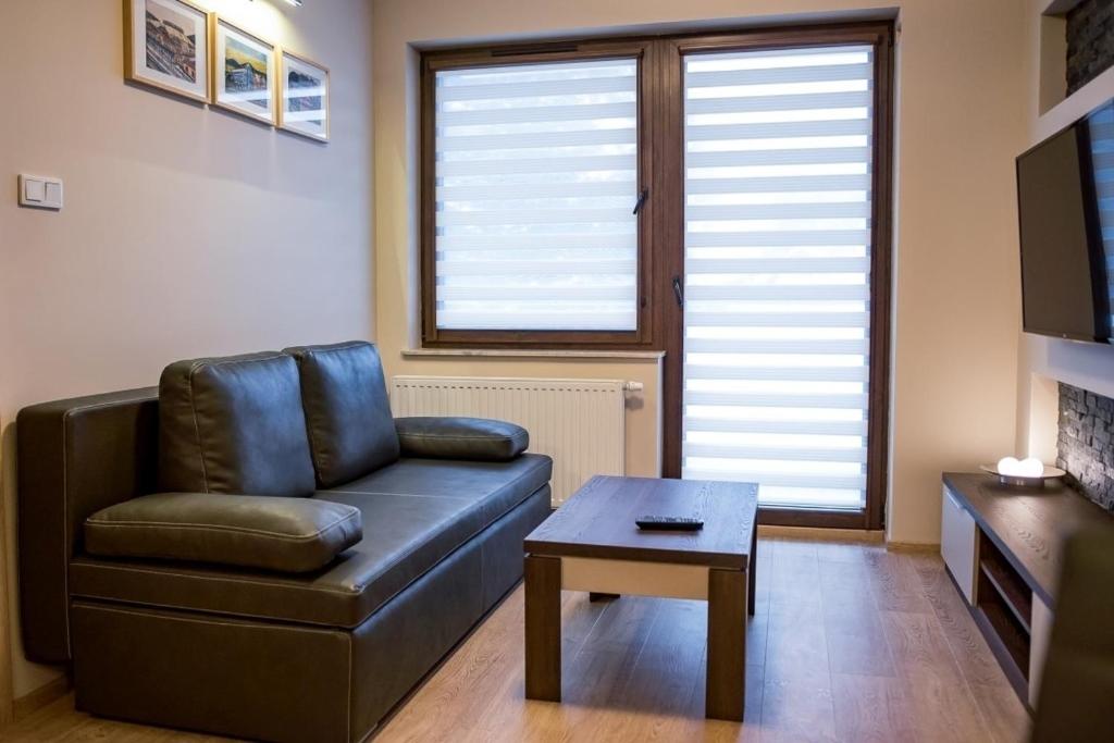 Apartamenty Sun & Snow Zielony Zdrój - 一居室公寓，带有付费车库