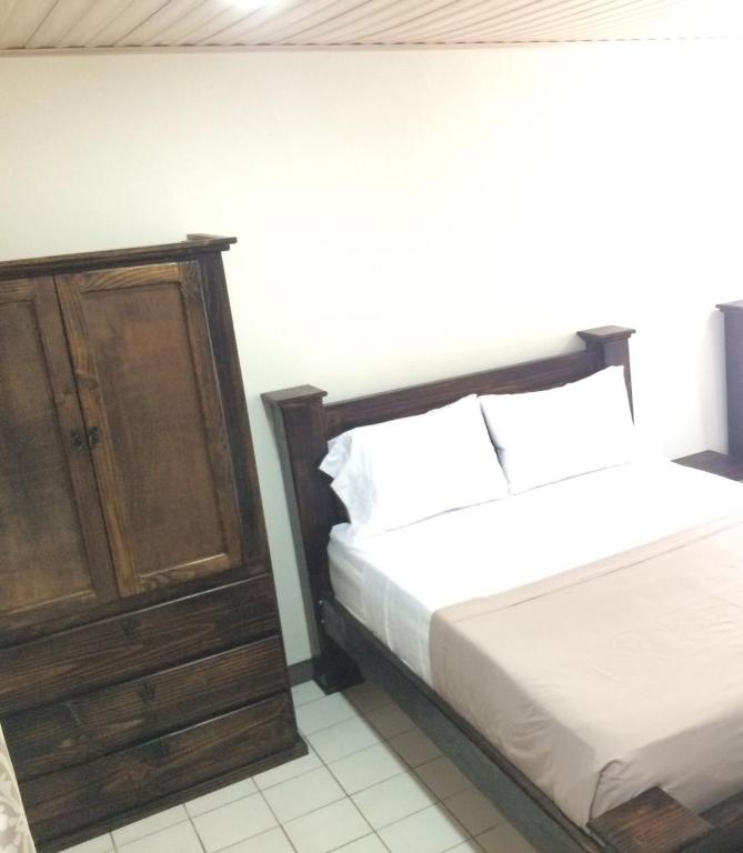 Postel nebo postele na pokoji v ubytování Hotel Don Fito