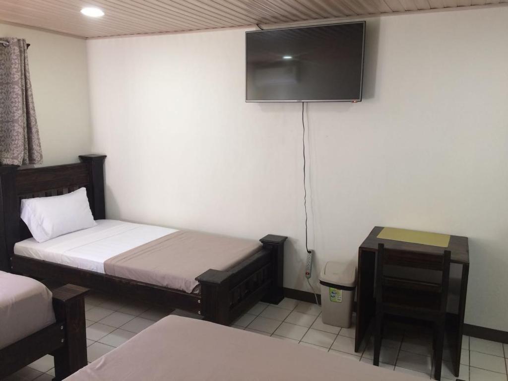 Postel nebo postele na pokoji v ubytování Hotel Don Fito