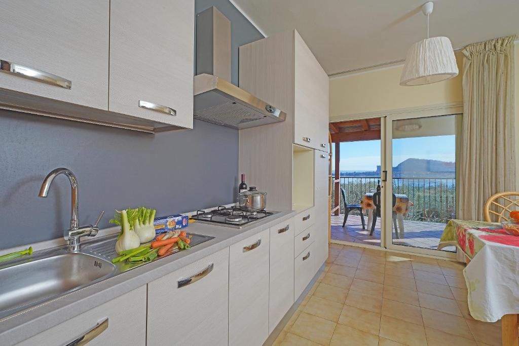 A kitchen or kitchenette at Villenpark Sanghen
