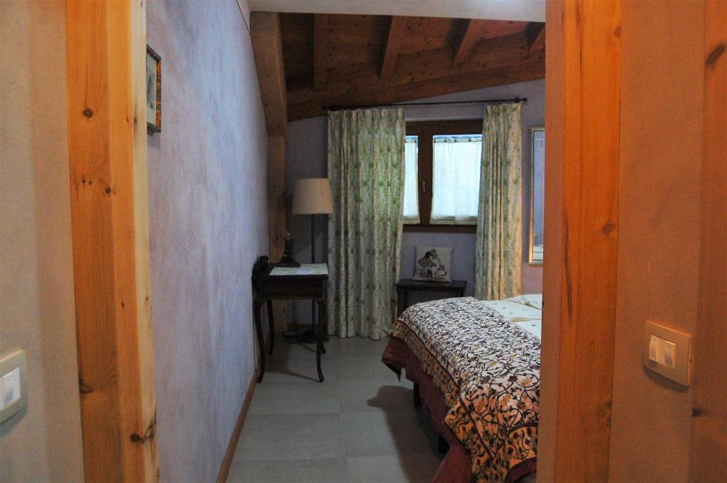 Postel nebo postele na pokoji v ubytování B&B Al Mulino