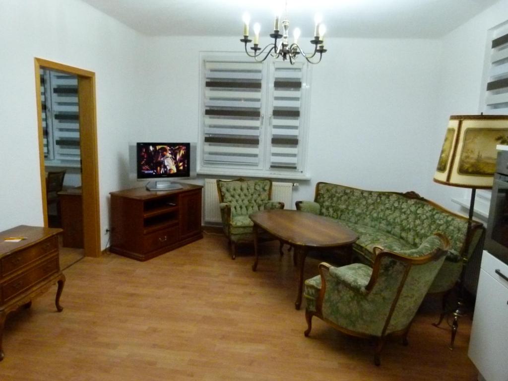 TV a/nebo společenská místnost v ubytování Ferienwohnung Amanda