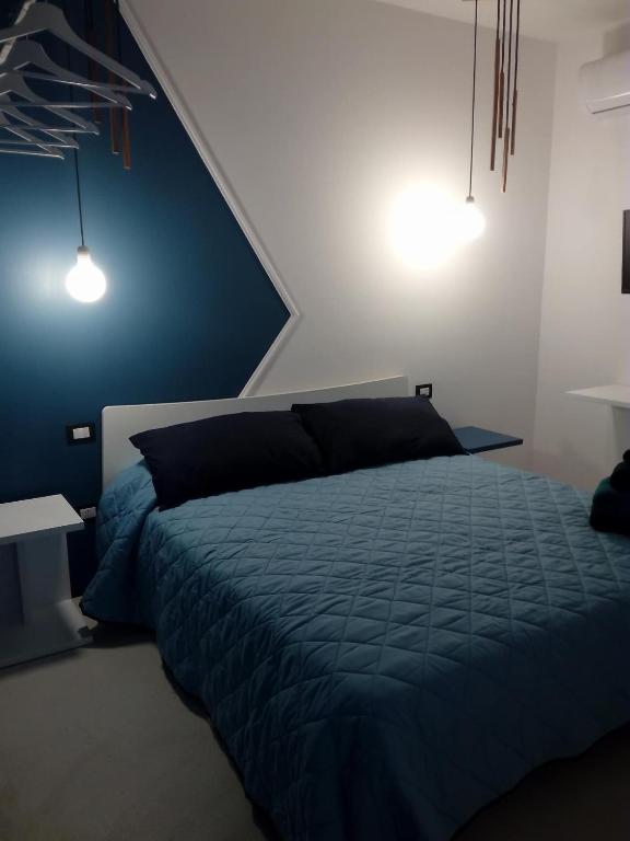 Postel nebo postele na pokoji v ubytování Ananke B&B
