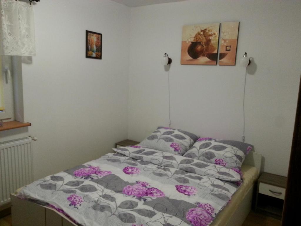 Posteľ alebo postele v izbe v ubytovaní Pod Klonem