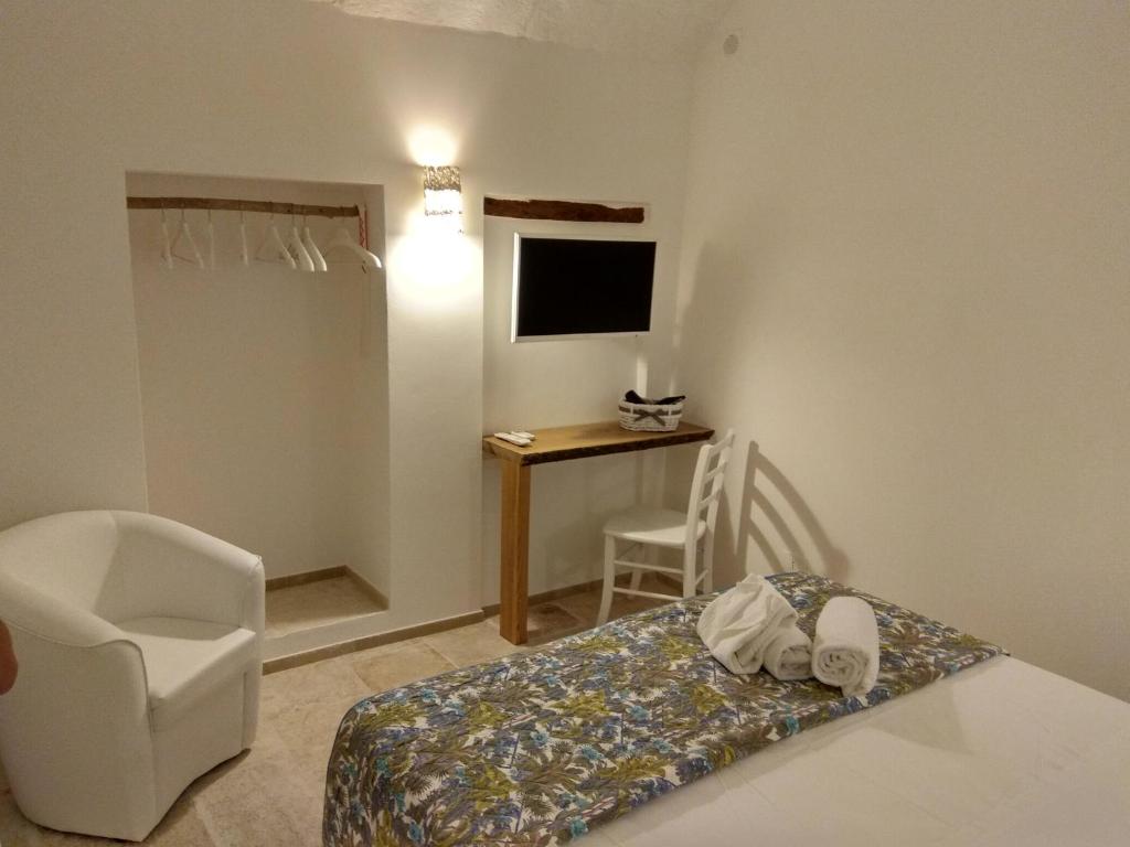 Giường trong phòng chung tại Loft Nonna Francesca