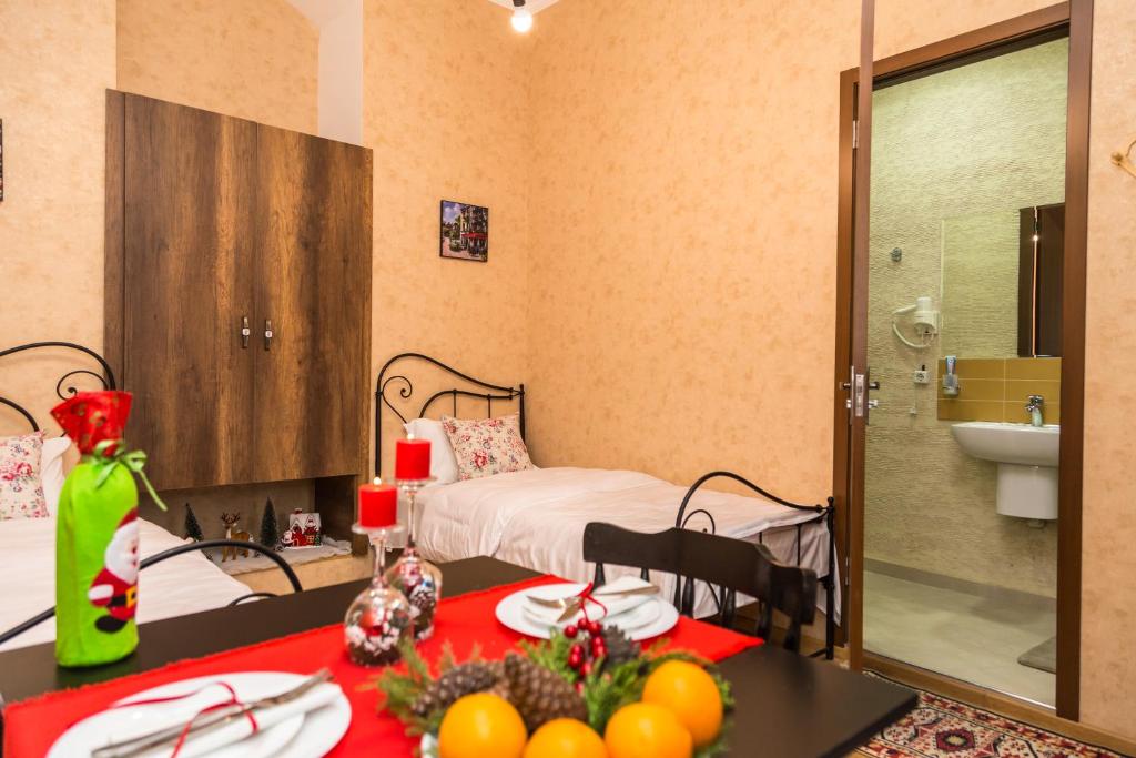Postel nebo postele na pokoji v ubytování Atlant Hotel