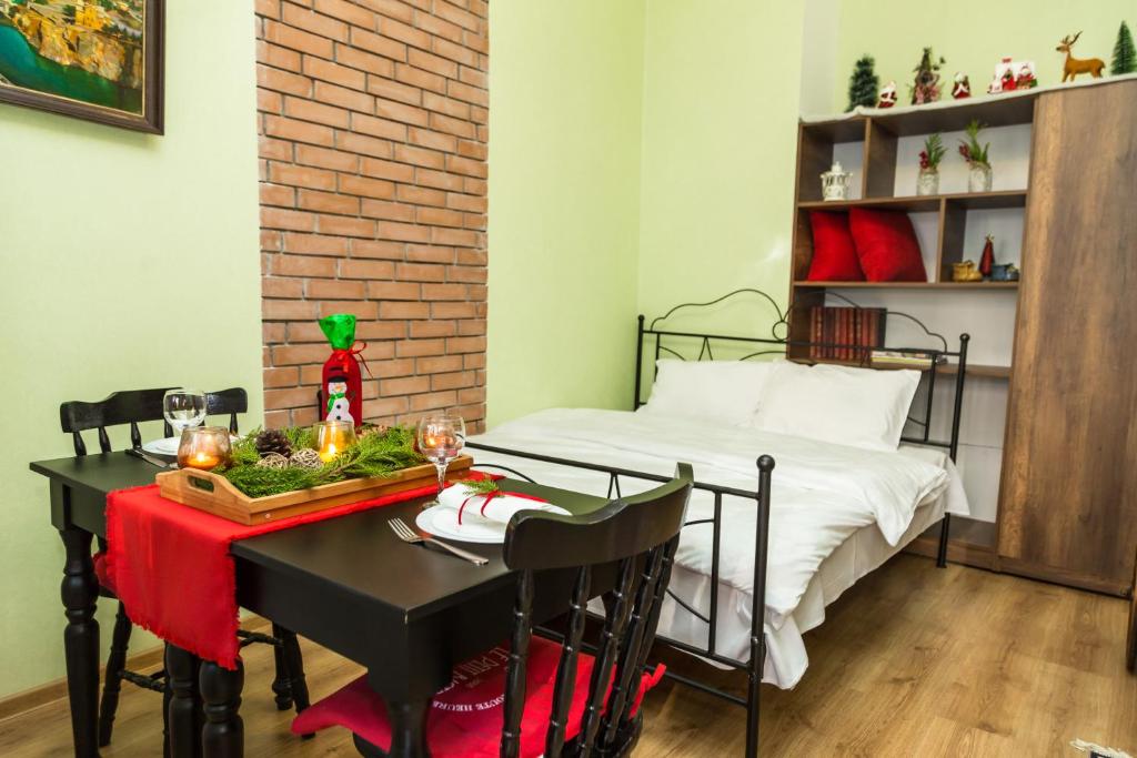 Postel nebo postele na pokoji v ubytování Atlant Hotel