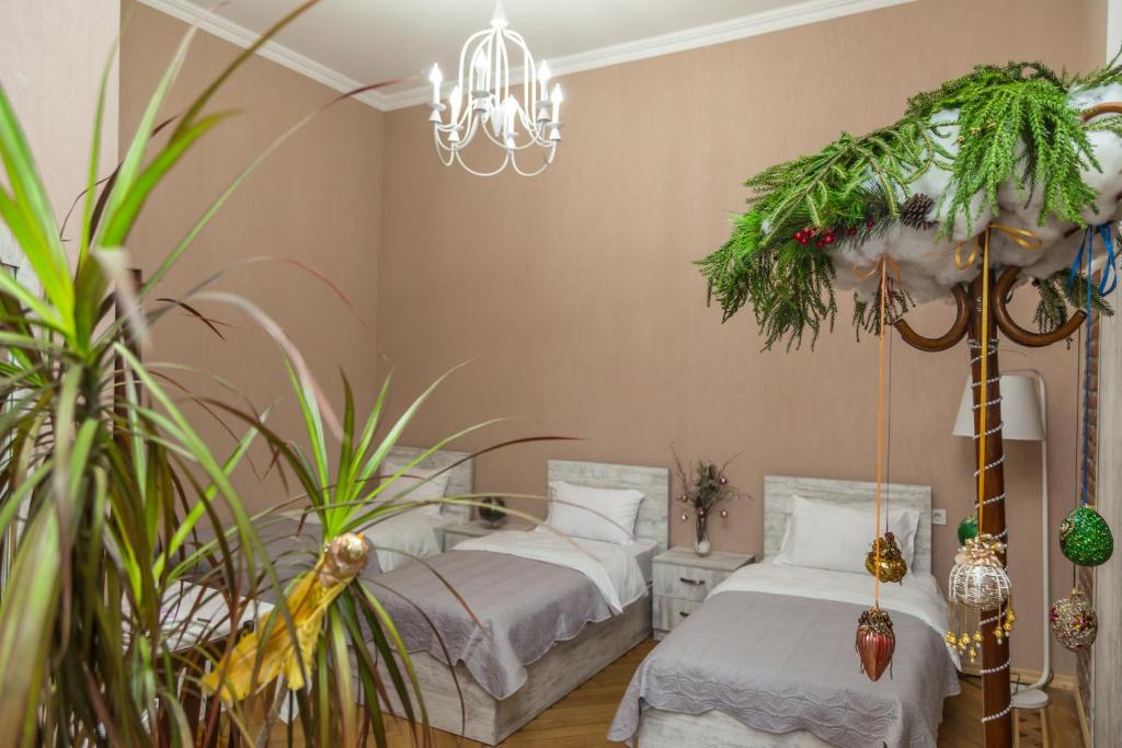 Postel nebo postele na pokoji v ubytování Atlant Hotel
