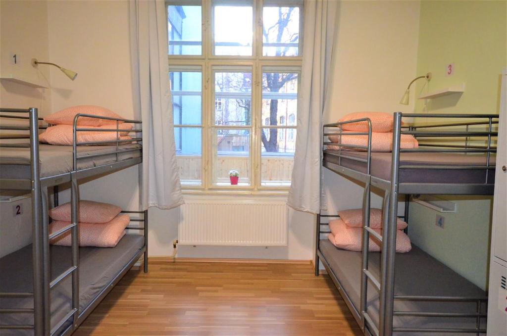 Postel nebo postele na pokoji v ubytování Travel&Joy backpackers