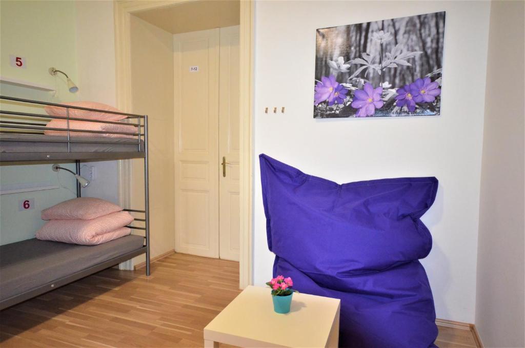 Postel nebo postele na pokoji v ubytování Travel&Joy backpackers
