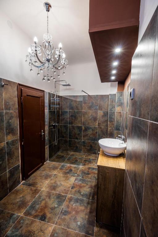 Koupelna v ubytování Ben Akiba Luxury Suites