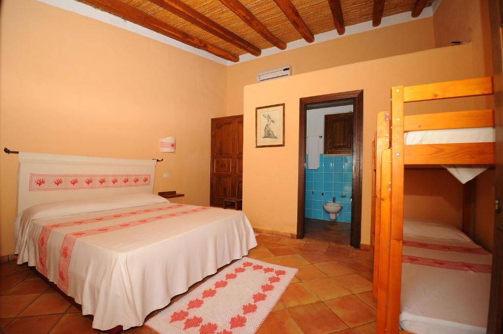 Postel nebo postele na pokoji v ubytování Santa Maria Resort