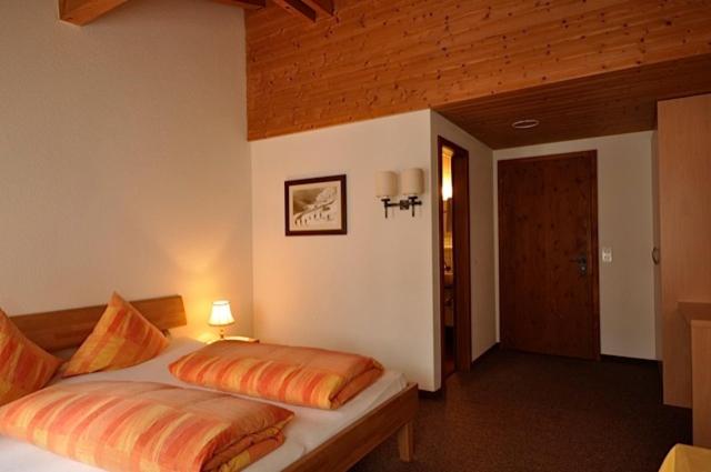 Postel nebo postele na pokoji v ubytování Gasthaus Skiklub