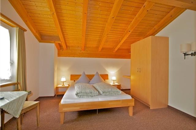 Postel nebo postele na pokoji v ubytování Gasthaus Skiklub