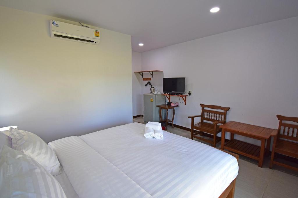 Postel nebo postele na pokoji v ubytování Anissa Resort Koh Yao Yai