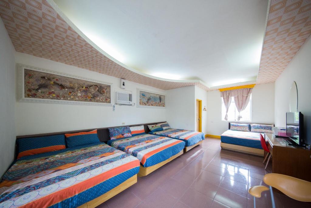 Postel nebo postele na pokoji v ubytování Blue Sea Romance B&B
