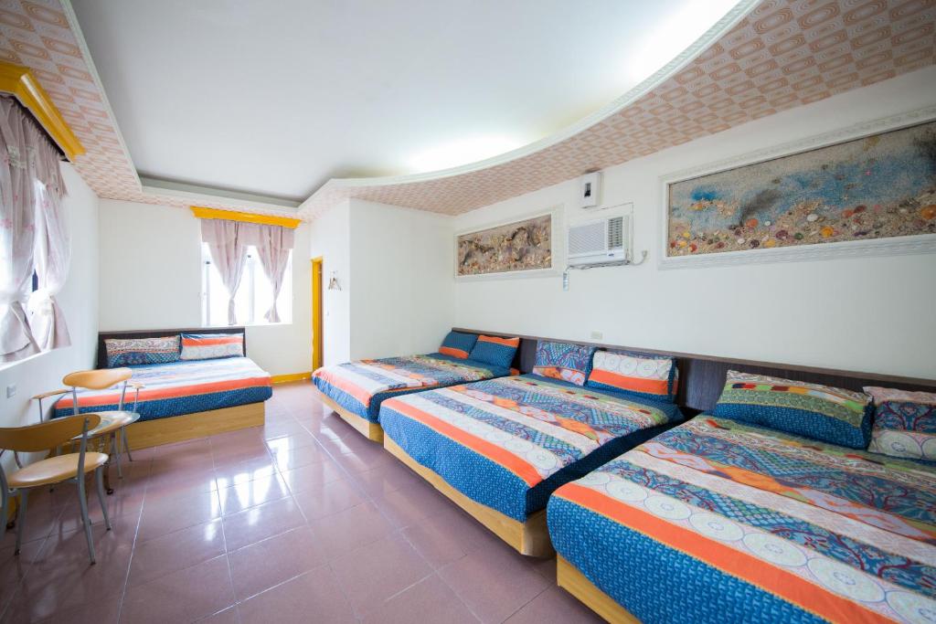 Postel nebo postele na pokoji v ubytování Blue Sea Romance B&B