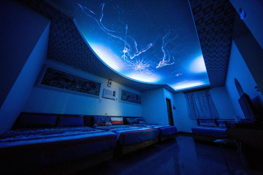 Postel nebo postele na pokoji v ubytování Blue Sea Romance B&B
