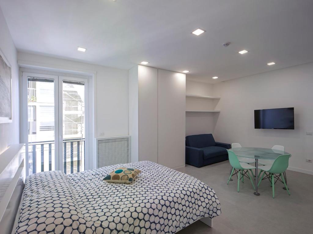 Postel nebo postele na pokoji v ubytování Relais Castel Nuovo
