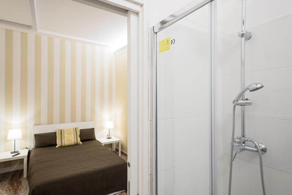 Postel nebo postele na pokoji v ubytování Camere Pallotta