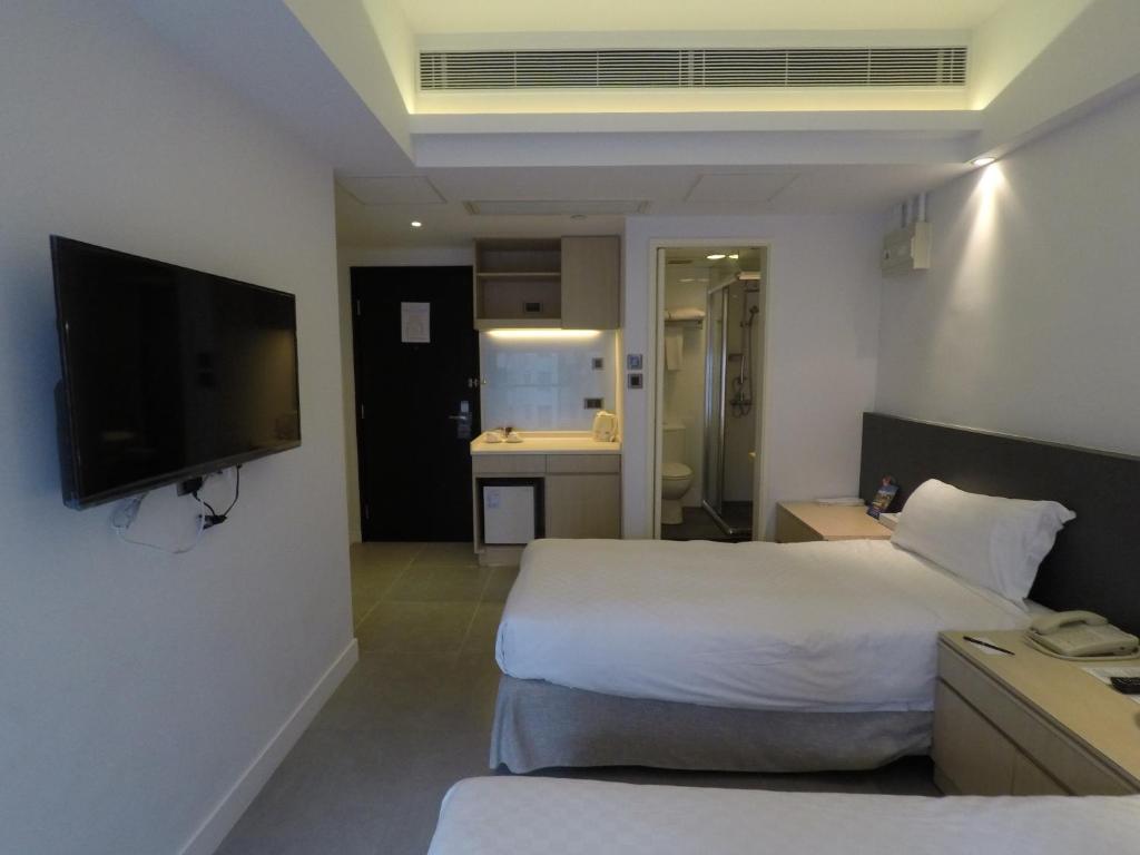 TV a/nebo společenská místnost v ubytování Wifi Boutique Hotel