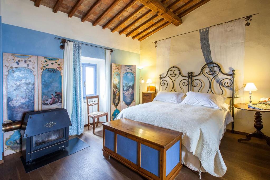 Postel nebo postele na pokoji v ubytování B&B Le Due Volpi