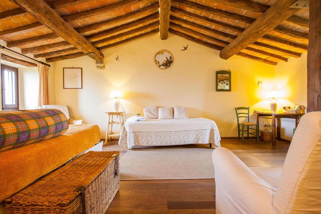 Postel nebo postele na pokoji v ubytování B&B Le Due Volpi