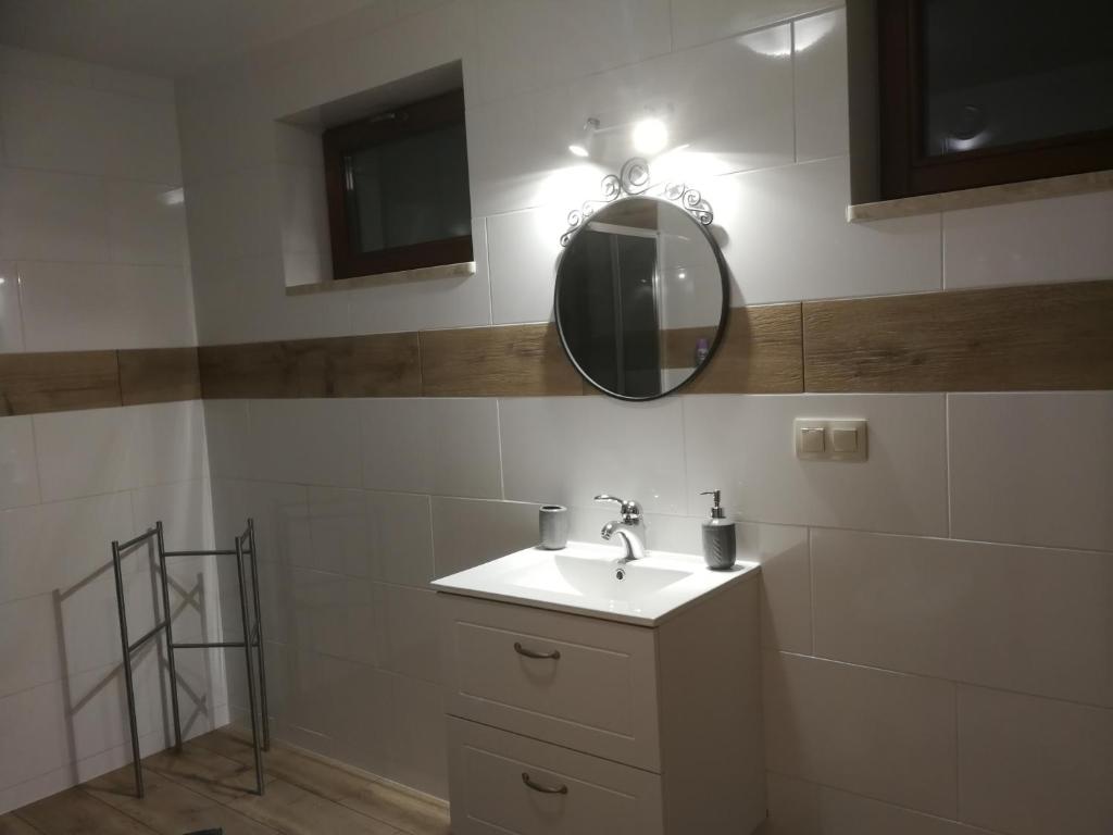 Kúpeľňa v ubytovaní Apartamenty w Gorach Stolowych