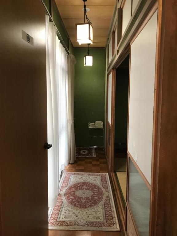 Fotografie z fotogalerie ubytování Nakaya House v destinaci Mijadžima