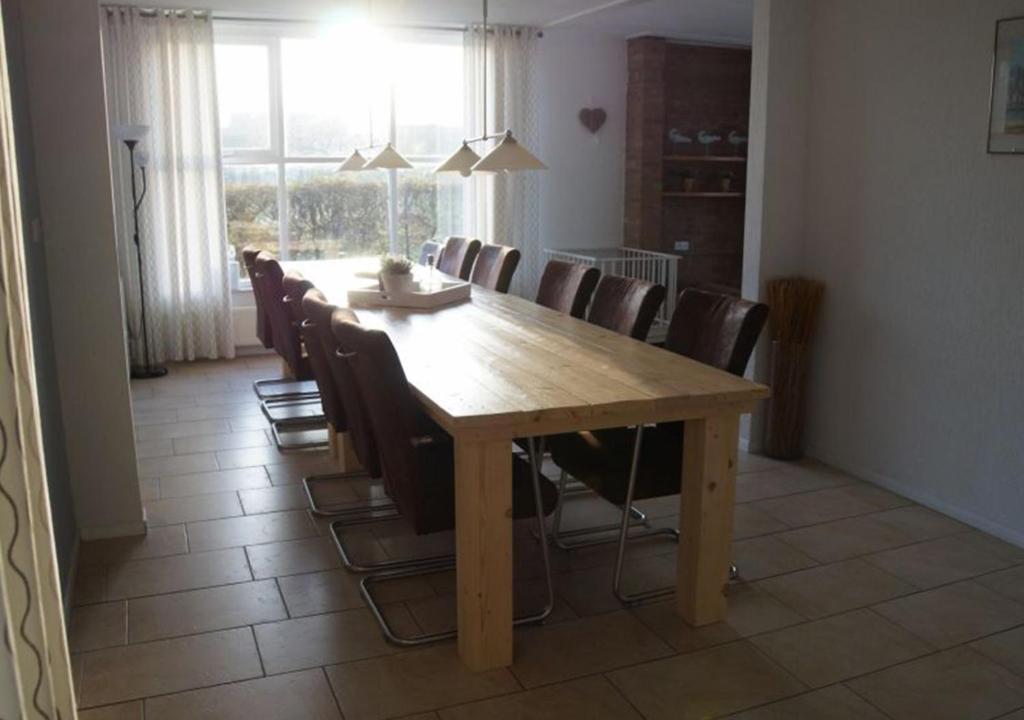 Posezení v ubytování Vakantiehuizen Hofstede Elzenoord