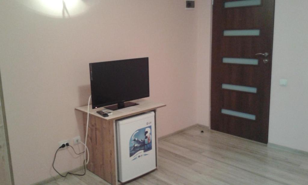 TV a/nebo společenská místnost v ubytování Vila Adriano