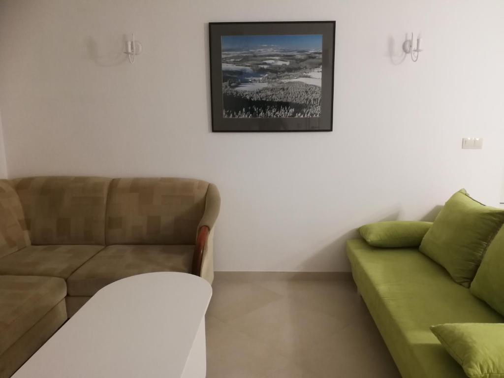 Posedenie v ubytovaní Apartamenty w Gorach Stolowych
