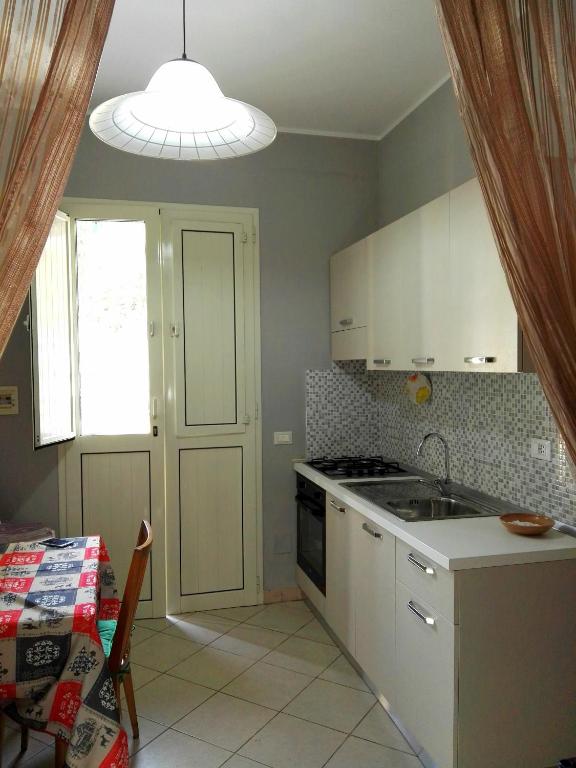 Kuchyň nebo kuchyňský kout v ubytování Case Barone di Muro