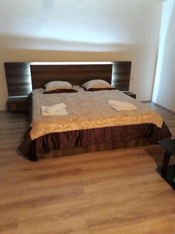 Postel nebo postele na pokoji v ubytování Guest House Khergiani