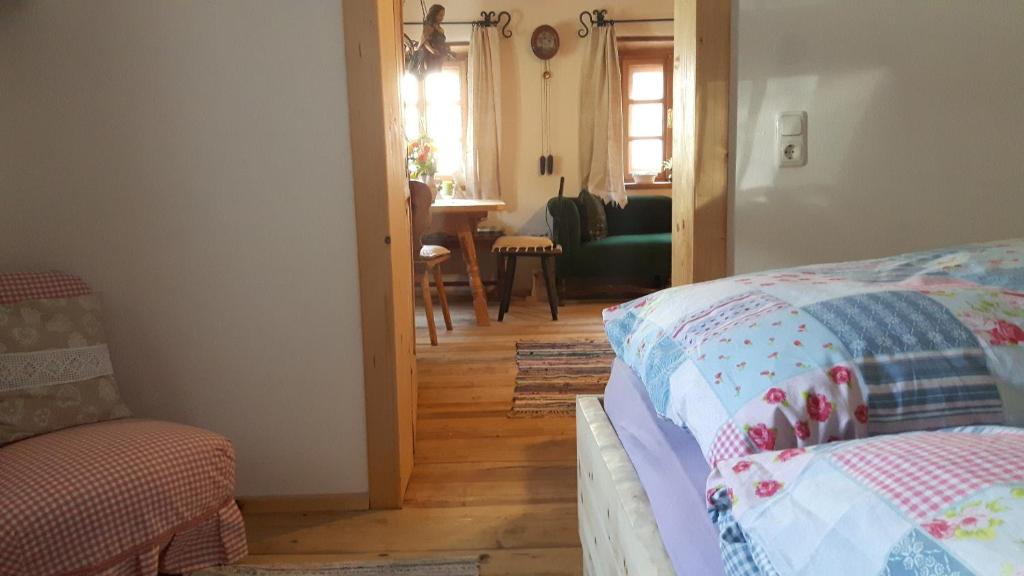 Postel nebo postele na pokoji v ubytování Ferienappartement am Leisnitzbach