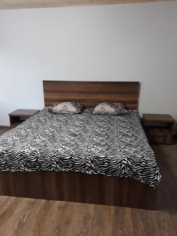 Postel nebo postele na pokoji v ubytování Guest House Khergiani