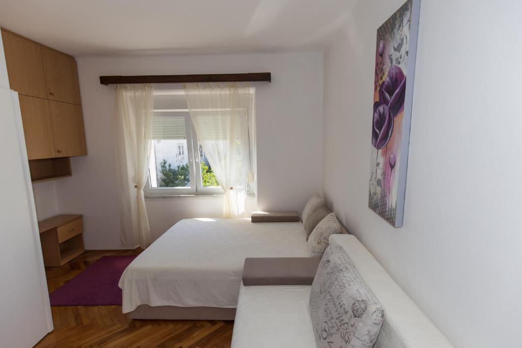 Postel nebo postele na pokoji v ubytování Apartment Davorka