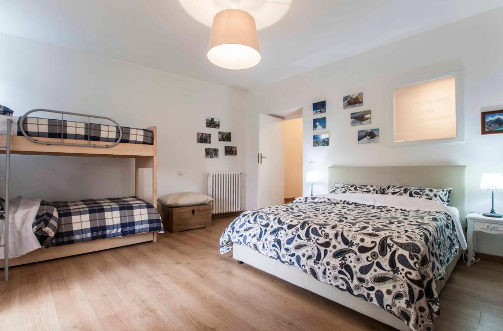 A bed or beds in a room at Casa dell'Avventura