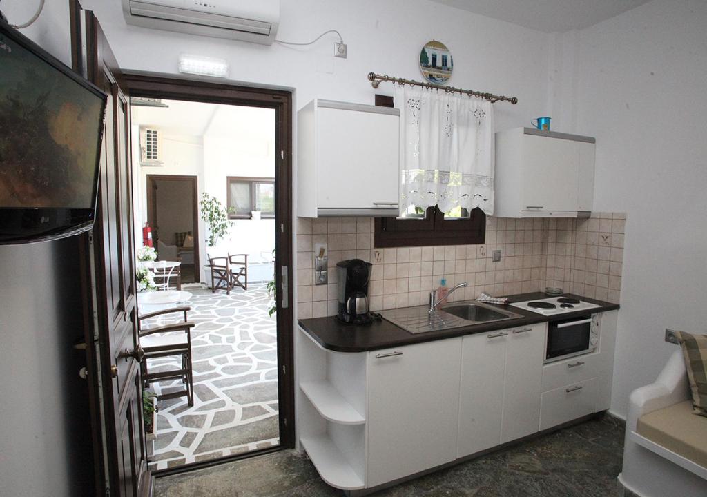 Kuchyň nebo kuchyňský kout v ubytování Pergola
