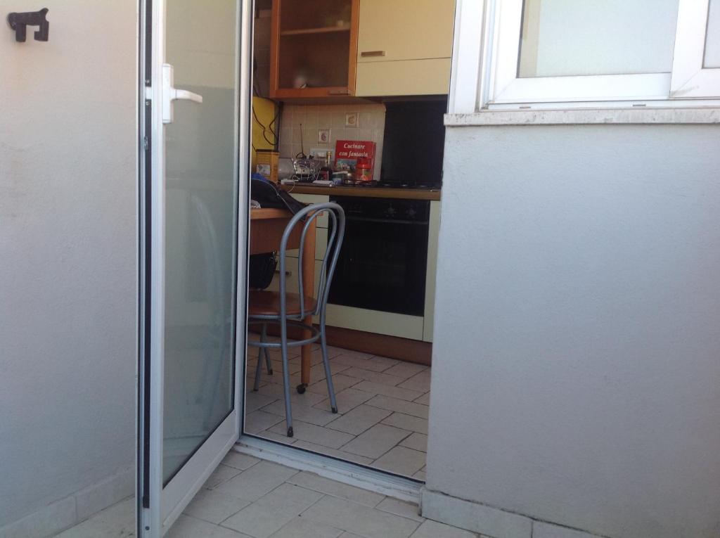 A kitchen or kitchenette at Monolocale Monteverde