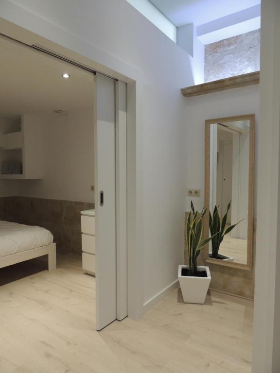 Posteľ alebo postele v izbe v ubytovaní Apartamento Ribera Del Puente